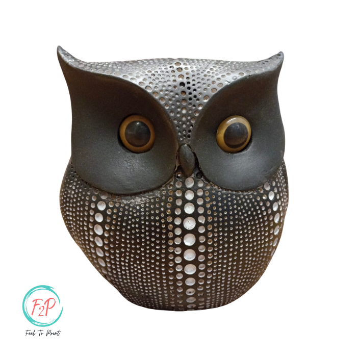 Monochrome Majesty: Resin Owl Statue in Black and White