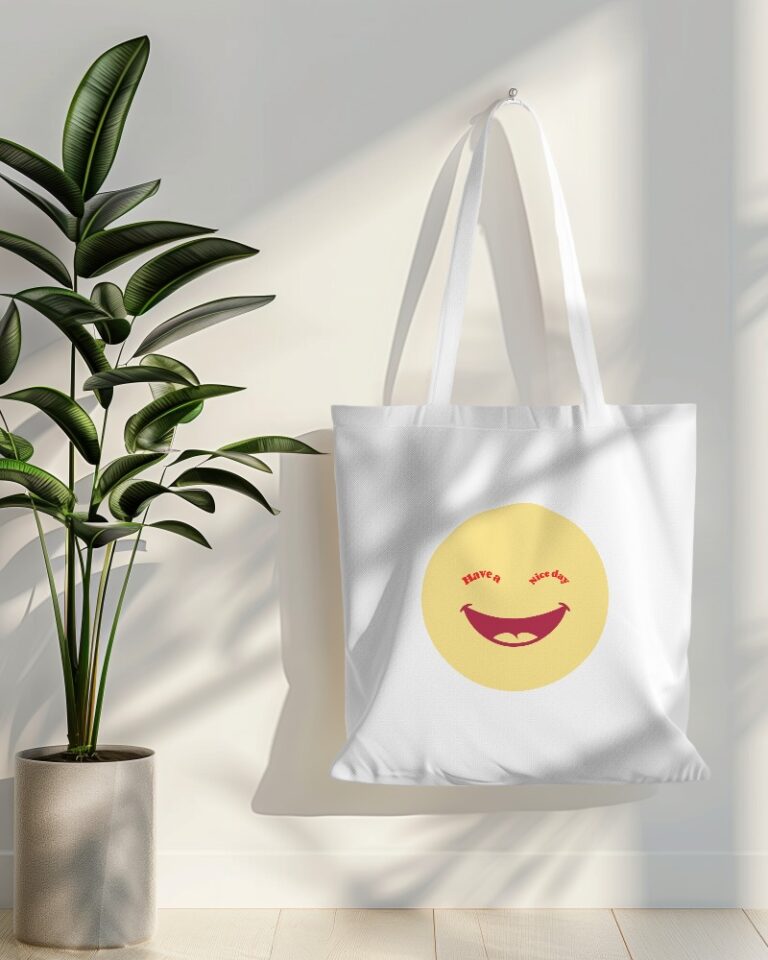 tote bag mockup hanging on white wall with plant in side 019 (10)