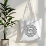 tote bag mockup hanging on white wall with plant in side 019 (3)