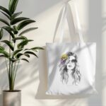 tote bag mockup hanging on white wall with plant in side 019 (7)