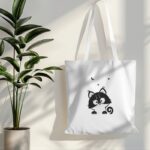 tote bag mockup hanging on white wall with plant in side 019 (8)